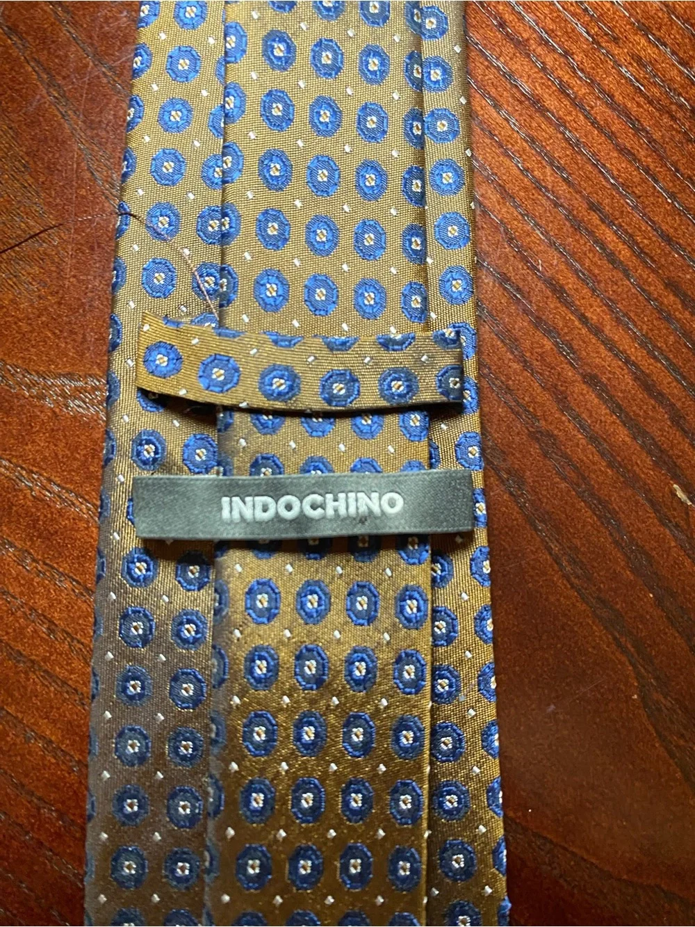 Indochino Men’s Brown Pattern Silk Tie with Blue and Cream Medallions